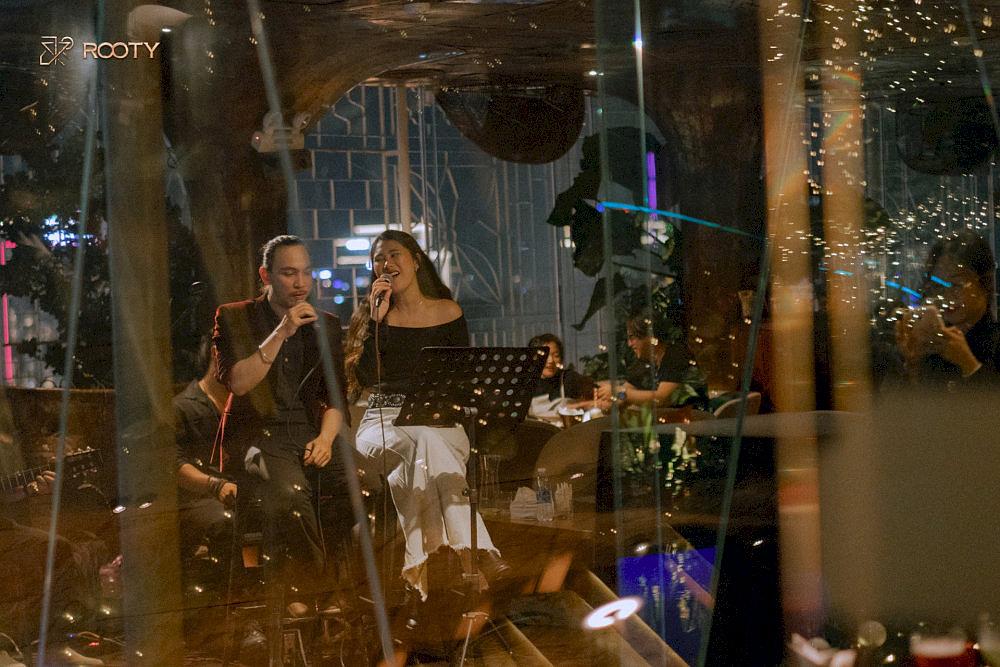 The raw, heartfelt sound of acoustic nights at Rooty feels like a gentle whisper amid a bustling city